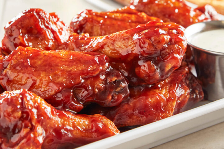 Wings - Boneless or bone-in, tossed in your choice of sauce or rub